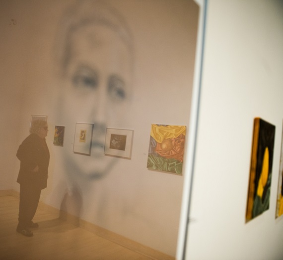 A person viewing the Senior Thesis Exhibit