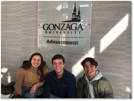 Megan, Alex, and David Giaccobi in the University Advancement lobby