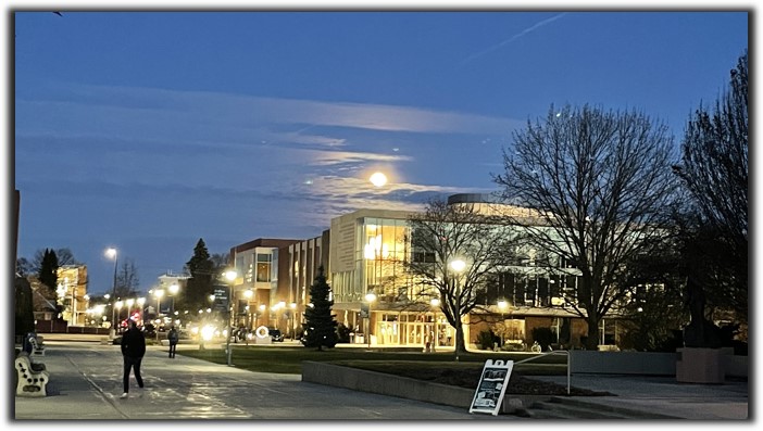 Full moon above Hemmingson Center on Easter