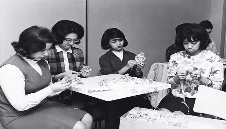 Gonzaga students working on flowers