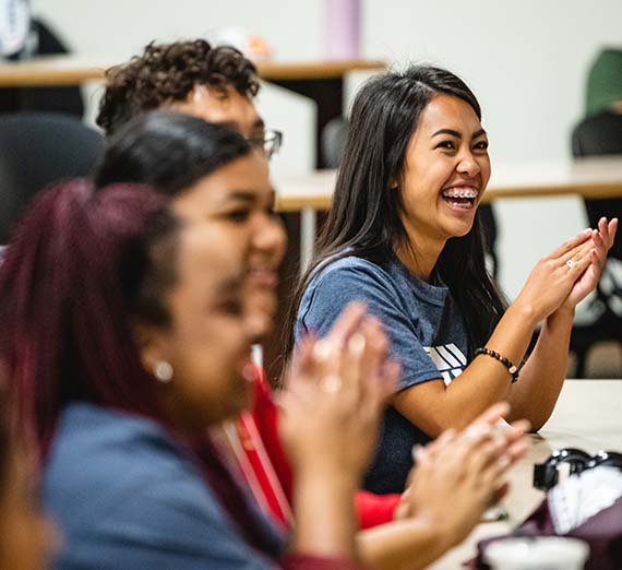 Smiling students of color.