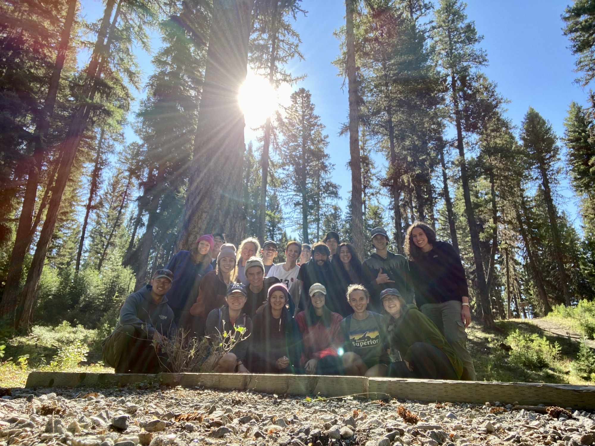 Water with mountains in the background during sunset.