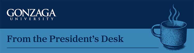 blue writing with steaming cup of coffee