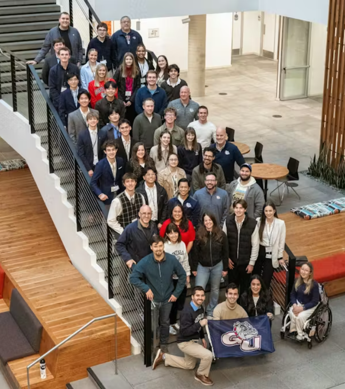 Current Zags joined alumni working at Microsoft for a photo on the stairs