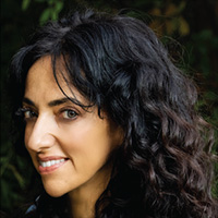 Headshot of Huwaida Arraf