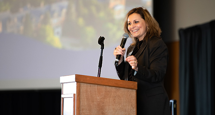President Passerini addresses a crowd.