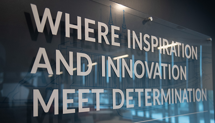 A plaque that reads: Where Inspiration and Innovation meet Determination. 