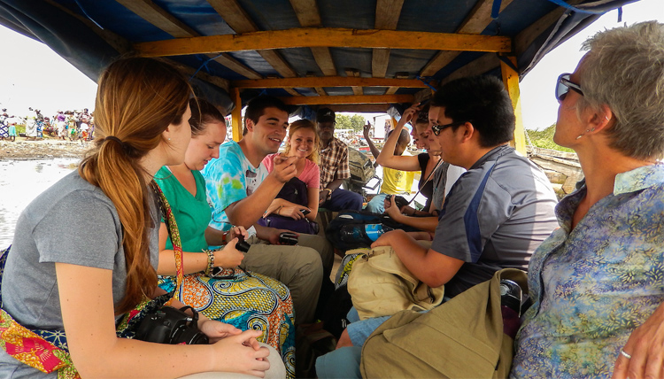 Study Abroad students in Benin traveling by bus.