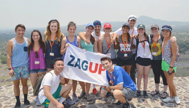 Study Abroad students group photo on top of the Sun Pyramid in Mexico