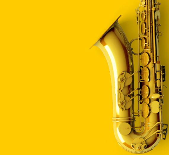 Image of a Brass saxophone on a bright, yellow background