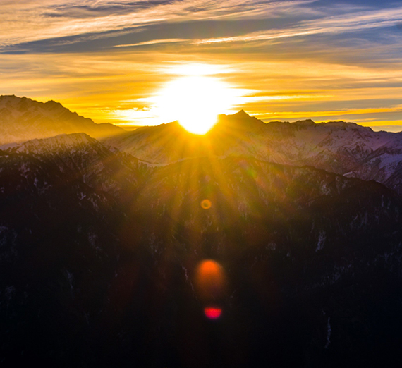Image of a Sunrise over a Mountain Range