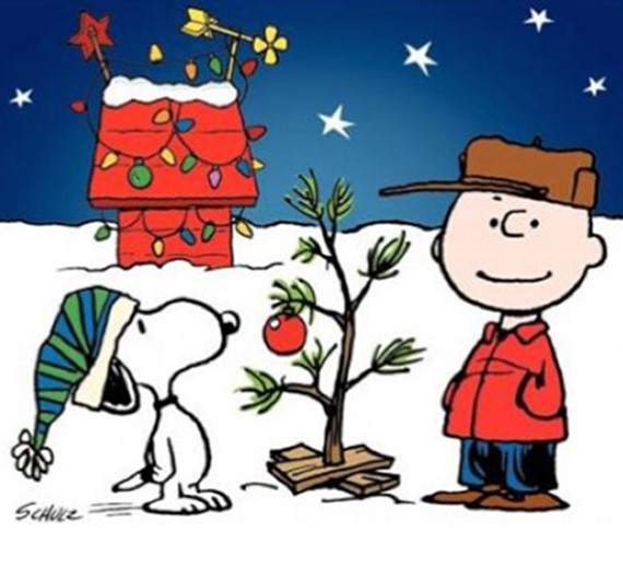 Image of Charlie Brown and Snoopy in front of a Christmas Tree