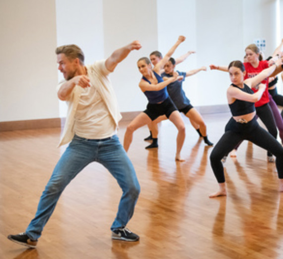 Derek Hough leading a masterclass with Gonzaga Dance Students
