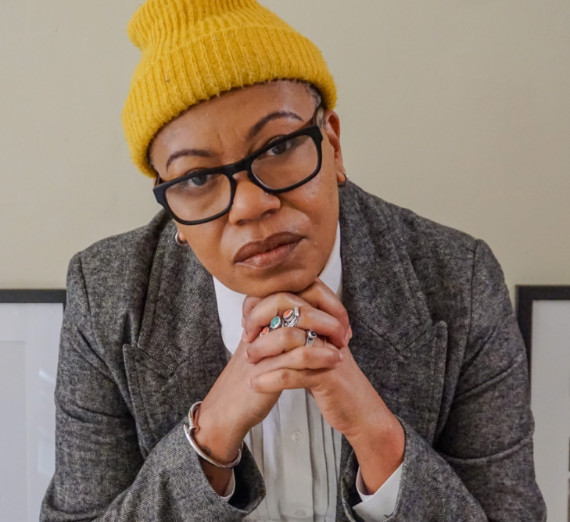 Anastacia-Reneé, an author-poet, educator, and interdisciplinary artist.