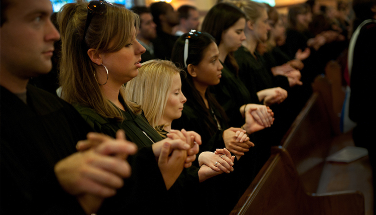 Holy Mass people in pews