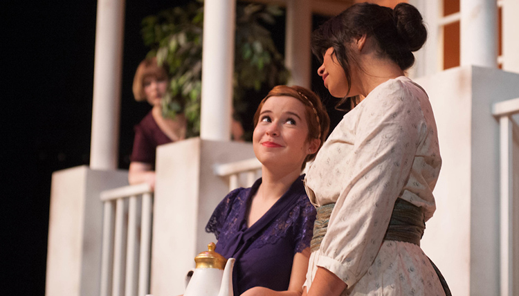 Magnuson Theatre actresses on stage.