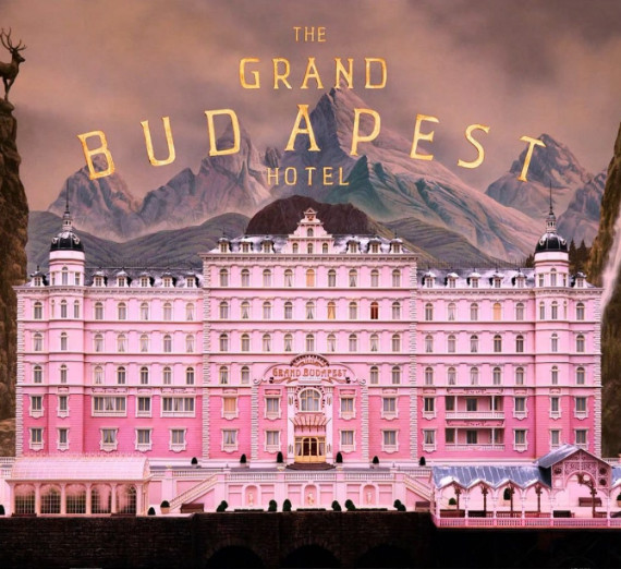 The Grand Budapest Hotel Movie Poster with a hotel in the mountains and the movie title at the top. 