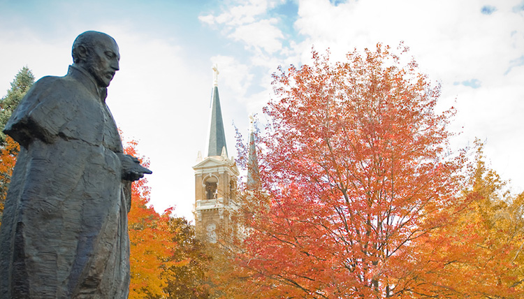 St. Ignatius statue in autumn