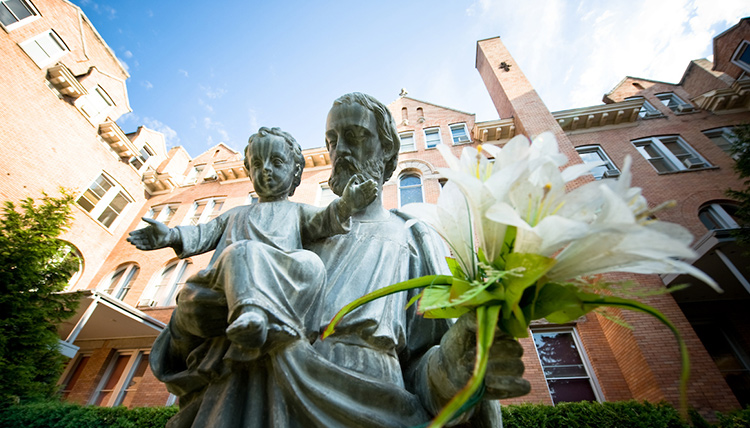 Statue of St. Joseph holding Jesus