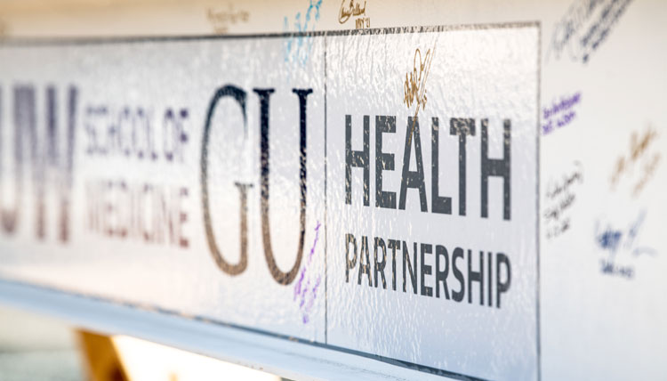 Signed beam for the UW-GU Health Partnership building. 