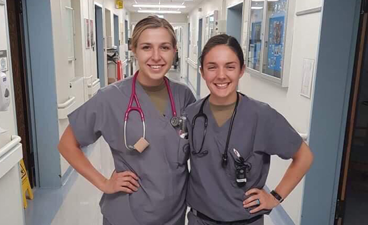 Nurses Garosi and Yingling pose for a photo in a hospital in Germany