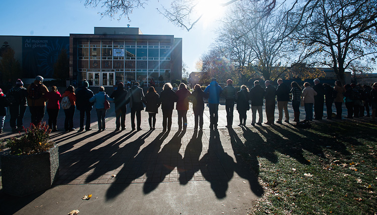 The International Day of Tolerance gathered students, faculty, and staff together and they linked arms to form a human chain of solidarity.