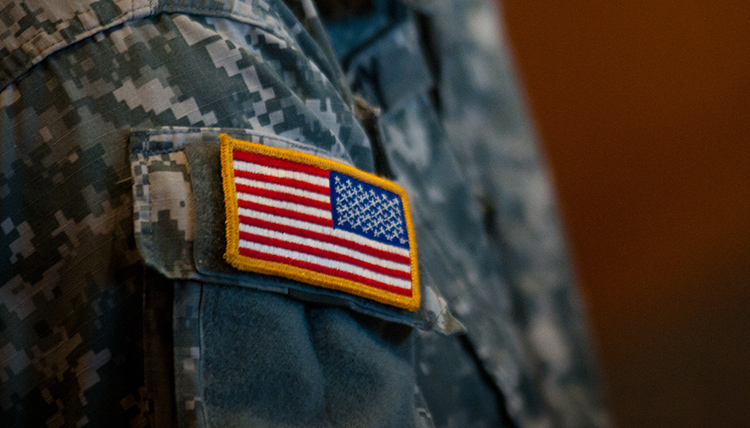 Flag on a military uniform at a veterans event on campus