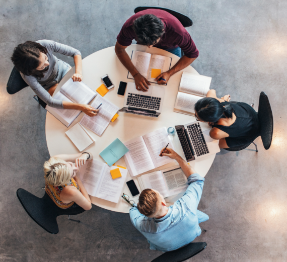 Students sitting at a round table