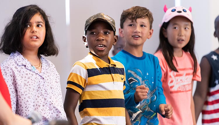 Teacher with Students at Table