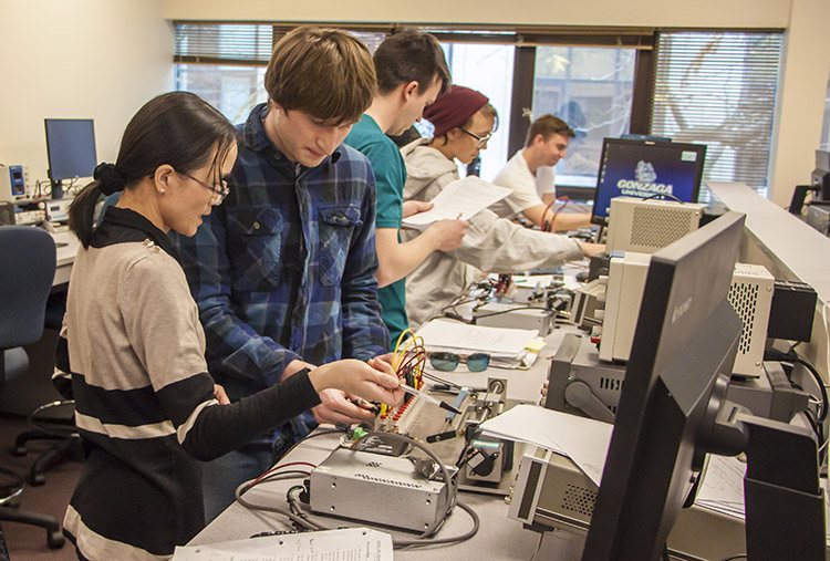 Dr. Mary Zhang and computer engineering students