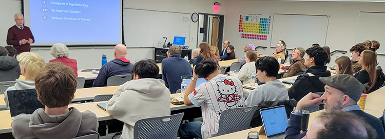 Dr Quinn presents his lecture to Gonzaga students and faculty