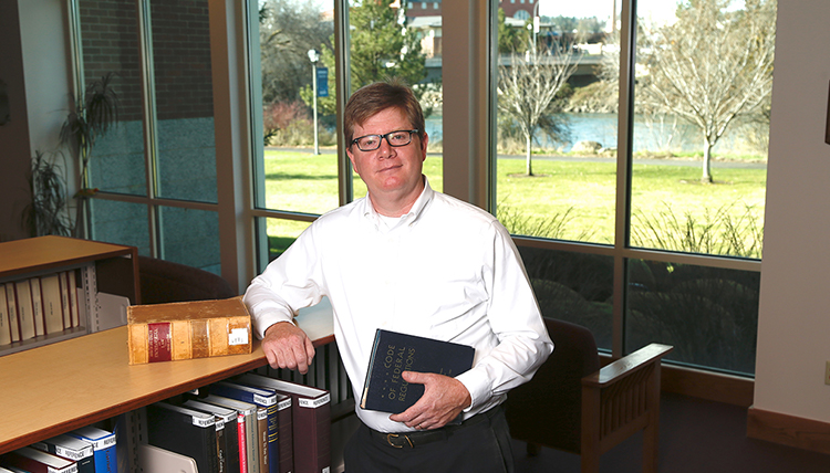 Library Director Patrick Charles in Chastek Library