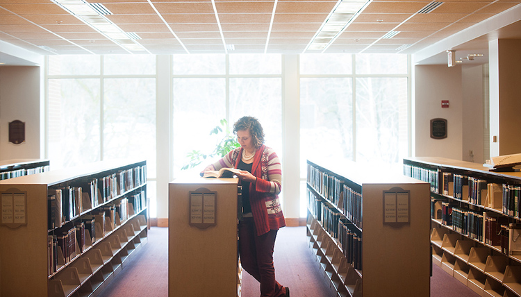 Woman studying in Chastek Library