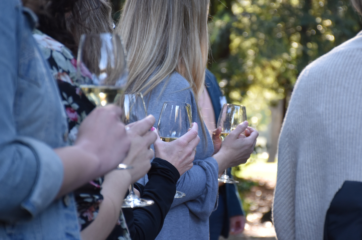 wine institute students holding wine glasses