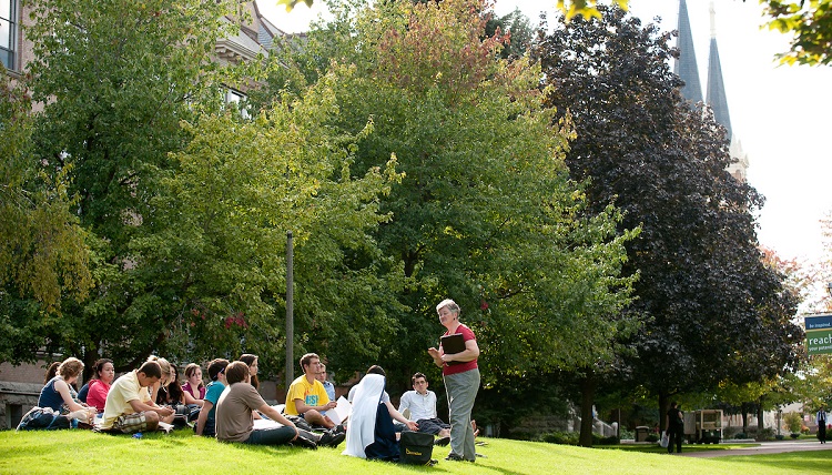 Students enjoying class outside.