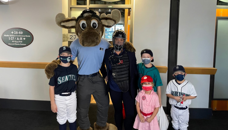 Brooke Sullivan with her kids at the Mariners stadium on Halloween