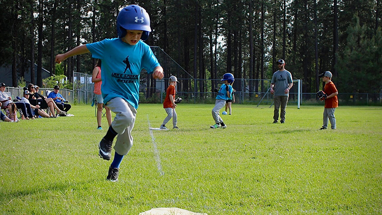 Klein baseball kid runs the bases