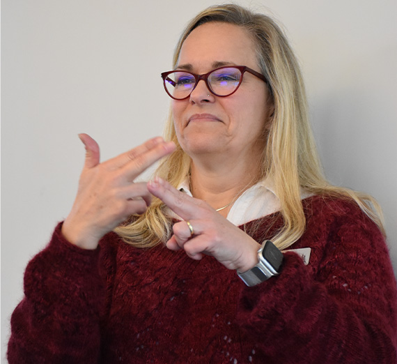 Rina Clark teaching ASL 