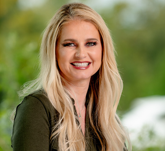 Headshots of four new faculty members