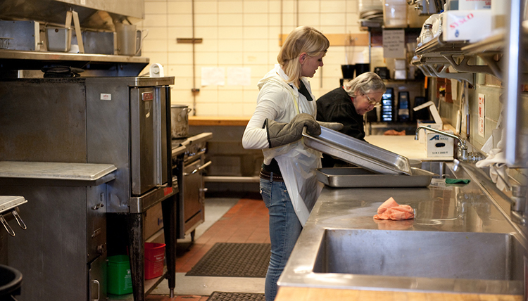 Campus Kitchens in Cataldo works with students to prepare and serve people in the community.