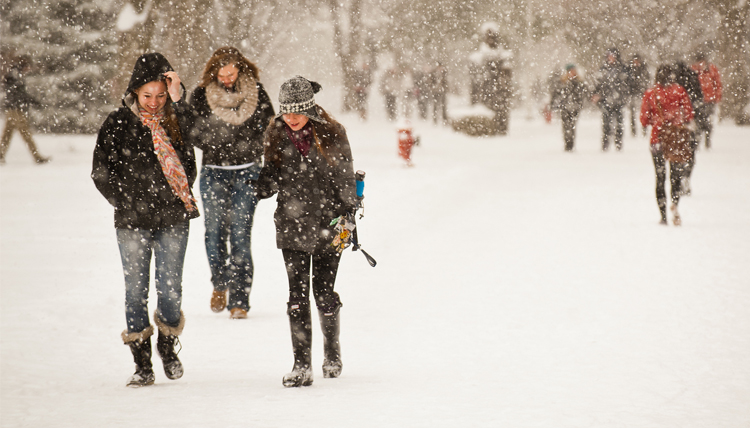 Students walking through the snow.