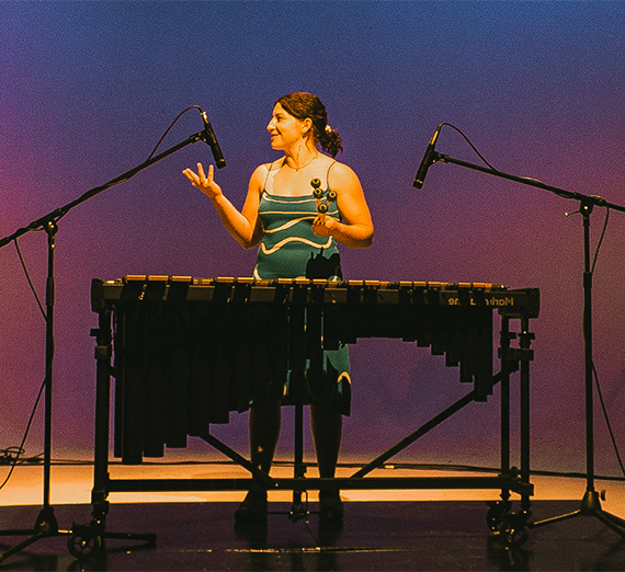 A presneter on stage.