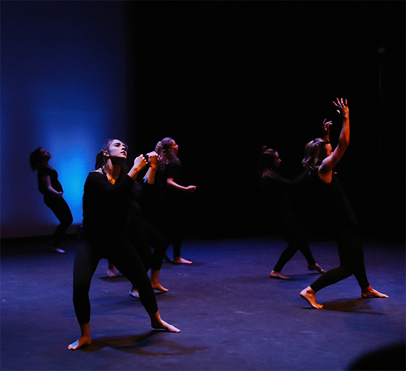 Student dancers perform in the Magnuson Theatre at Gonzaga University