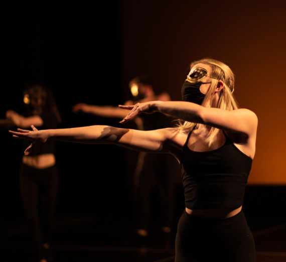 Photograph of student dancing for event purposes.