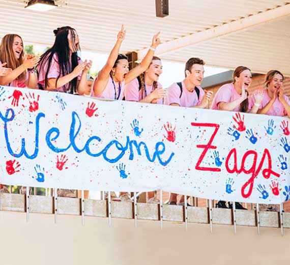 Cheering Students and Welcome Zags Sign