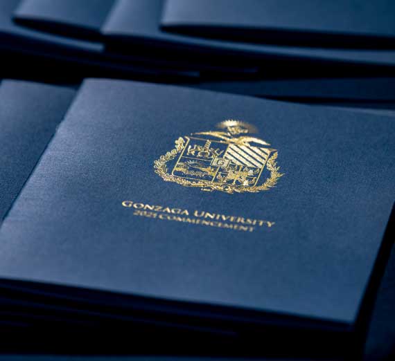 Undergraduate Commencement booklets laid out neatly