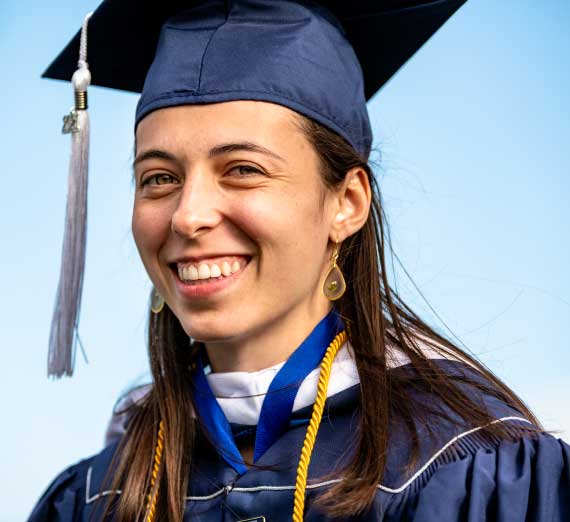 Student in Graduation Attire Posing for Portrait 