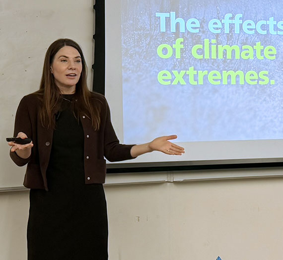 Rosentrater in front of presentation saying The effects of climate extremes