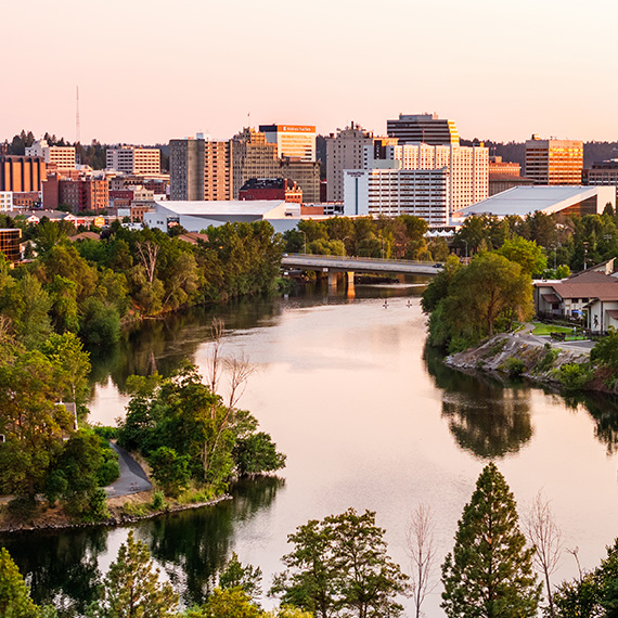 An aerial view of the Spokane River running into downtown Spokane.