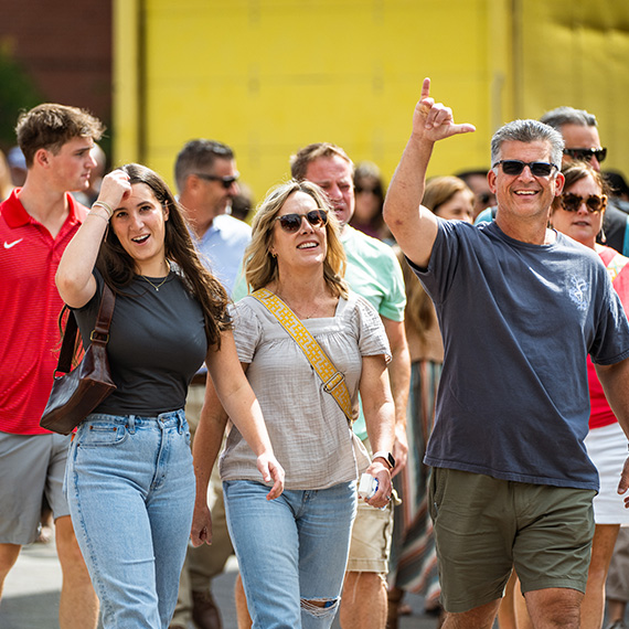 A Gonzaga student and her family walk through campus.